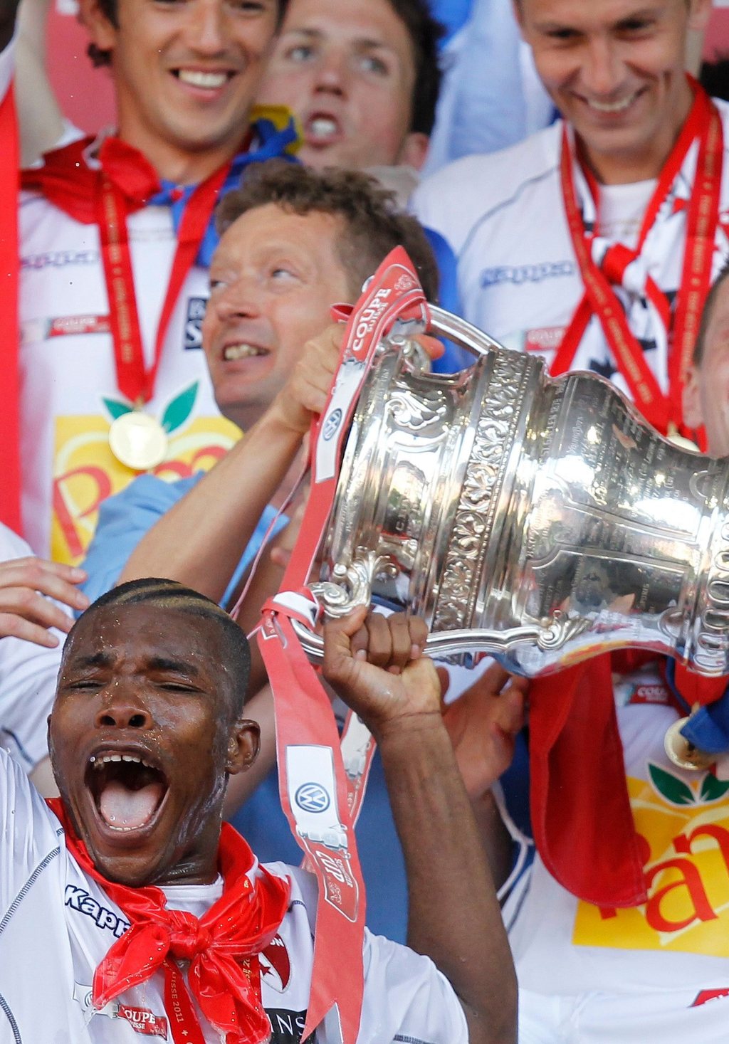 Sion's Geoffroy Serey Die celebrates after winning the Swiss Cup final soccer match between Neuchatel Xamax and FC Sion at the St. Jakob-Park stadium in Basel, Switzerland, Sunday, May 29, 2011. (KEYSTONE/Peter Klaunzer)